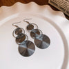 Alloy Geometric Round Mosquito Coil Interlocking Ear Hooks Light Luxury Style Earrings For Women