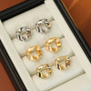 Alloy Geometric Twisted Triangle Ear Studs With Electroplating For Women