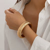 Alloy Glossy Leaf Spring Asymmetrical Pleated Wing Electroplated Geometric Personality Bracelet