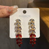 Alloy Light Luxury Leaf Tassel Earrings With Electroplating Process