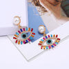 Alloy Pearl Exaggerated Devil's Eye Women's Diamond Earrings