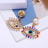 Alloy Pearl Exaggerated Devil's Eye Women's Diamond Earrings