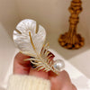 Alloy Pearl Feather Women's Brooch With Electroplating Treatment And Natural Style
