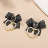 Alloy Pearl Inlaid Heart Shape And Bow Tie Earrings For Women