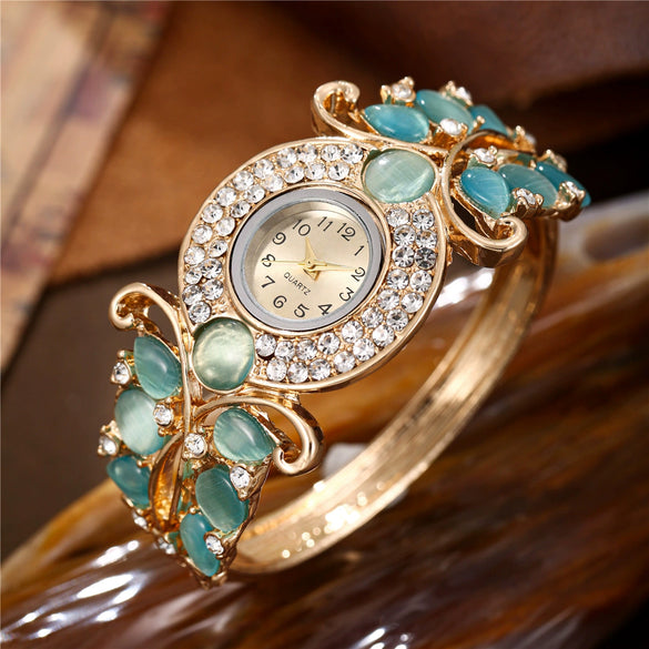 Alloy Quartz Watch With Diamond Decoration And Hollow Bracelet For Women Fashion Style Round Dial