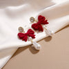 Alloy Retro Red Flocking Bow Pearl Earrings With Electroplating For Women