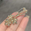 Alloy Women's Brooch With Flower Pattern And Electroplating Treatment