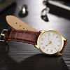 Business Style Alloy And Imitation Leather Quartz Watch With Round Dial And Stainless Steel Buckle