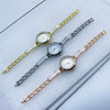 Casual Female Quartz Watch Alloy Strap Round Dial