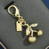 Cherry Pendant Keychain Jewelry For Women Made Of Metal And Crystal Resin With Dripping Oil Processing And Fruit Pattern