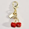 Cherry Pendant Keychain Jewelry For Women Made Of Metal And Crystal Resin With Dripping Oil Processing And Fruit Pattern