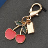 Cherry Pendant Keychain Jewelry For Women Made Of Metal And Crystal Resin With Dripping Oil Processing And Fruit Pattern