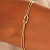 Copper Heart Knot Snake Chain Bracelet Electroplated Love Knot Couple Bracelet With Round Snake Bone Style For Unisex Wear