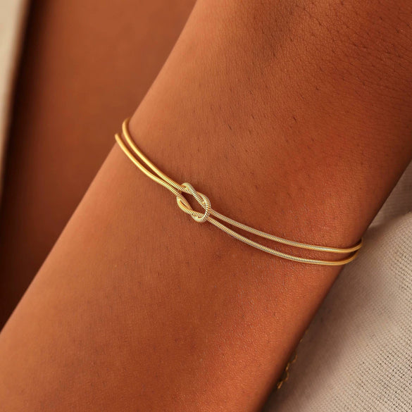 Copper Heart Knot Snake Chain Bracelet Electroplated Love Knot Couple Bracelet With Round Snake Bone Style For Unisex Wear