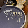 Copper Inlaid Zircon Bow Earrings For Women Light Luxury Highend Sense Niche Design Gentle Elegant Tassel Style