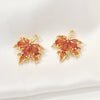 Copper Jewelry With 14K Gold Plated Red Zircon Maple Leaf Pendant Electroplating Treatment Plant Flowers Style