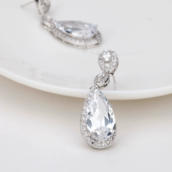 Copper Zircon Drop Earrings With Electroplated Finish For Bridal Wedding And Party Wear