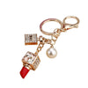 Cute Creative Pearl Bow Perfume Bottle Shaped Metal Keychain For Women As Bag Pendant Or Key Ring Diamond Gifts