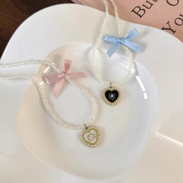 Elegant Glam Sweet Heart Shape Flower Bow Knot Imitation Pearl Alloy Beaded Inlay Rhinestones Pearl Women'S Pendant Necklace