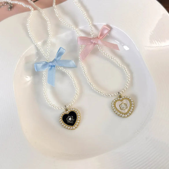 Elegant Glam Sweet Heart Shape Flower Bow Knot Imitation Pearl Alloy Beaded Inlay Rhinestones Pearl Women'S Pendant Necklace
