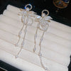 Elegant Light Luxury Alloy Pearl Long Tassel Geometric Earrings With Plants Flowers Style
