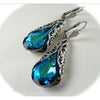 Elegant Metal Drop Shape Earrings With Hollow Design In Navy Blue Topaz Classical Palace Style
