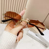 Elegant Simple Style Solid Color Pc Tinted Lenses Oval Frame Frameless Women'S Sunglasses