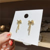 Elegant Women's Pearl Bow Diamond Earrings Simple 925 Silver Pin Metal Stud Earrings With Electroplated Finish