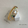 Enamel Heartshaped Wide Bangle Bracelet With Hollow Out Details And Plated Finish Fashion Jewelry