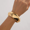 Exaggerated Geometric Metal Electroplated Irregular Wave Wide Spring Bracelet