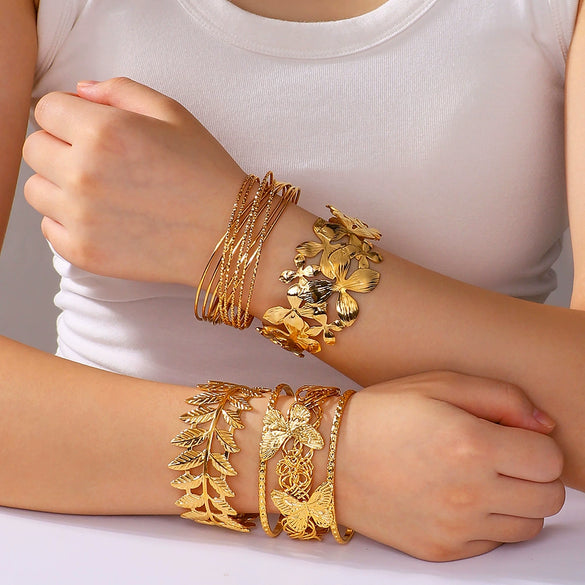 Exaggerated Hollow Flower Starfish Leaf Opening Women's Bracelet In Titanium And Stainless Steel With 18K Furnace Vacuum Plating