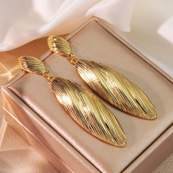 Exaggerated Retro Bohemian Style Stainless Steel Wire Drawing Striped Long Shell Pendant Earrings With Geometric Pattern And Electroplating