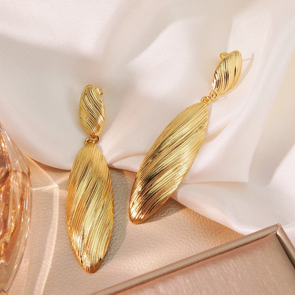 Exaggerated Retro Bohemian Style Stainless Steel Wire Drawing Striped Long Shell Pendant Earrings With Geometric Pattern And Electroplating