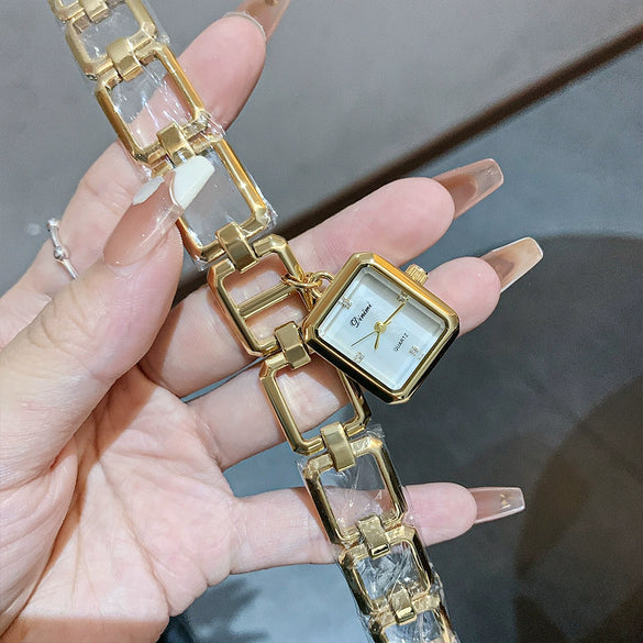 Fashion Alloy Square Hollow Bracelet Quartz Watch With Rhinestones And Retro Temperament For Female