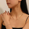Fashion Light Luxury Titanium Steel Jewelry Set With Four Leaf Flower Love Drops And Bell Patterns For Women Box Chain Included