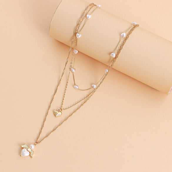 Fashion Multilayer Heartshaped Pearl Angel Wings Alloy Necklace For Female With Electroplating Treatment