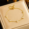Fashion Niche Transparent Love Accessories Gold Plated Stainless Steel Chain Bracelet Earrings Necklace Set With Rhinestones Love Water Drops Bells Pattern Electroplating