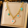 Fashion Personality Drop Oil Pink Love Eyes Blue Pine Stone Pendant Stainless Steel Necklace Earrings Bracelet Suit With Electroplating Love Water Drops Bells Pattern