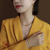 Fashion Personality Leaf Titanium Steel 18K Gold Electroplated Jewelry Necklace And Bracelet Set With Plant And Flower Pattern
