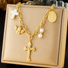 Fashion Retro Gold Plated Stainless Steel Oval Cross Pearl Pendant Necklace With Doll Pattern For Women