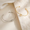 Fashion Simple Love Knot Opening Stainless Steel Women's Bracelet With 18K Gold Plating