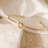 Fashion Simple Love Knot Opening Stainless Steel Women's Bracelet With 18K Gold Plating