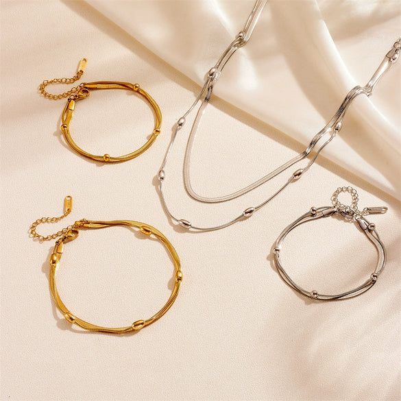 Fashion Stainless Steel And Titanium Steel Round Bead Necklace And Bracelet With Love Water Drops Bell Pattern