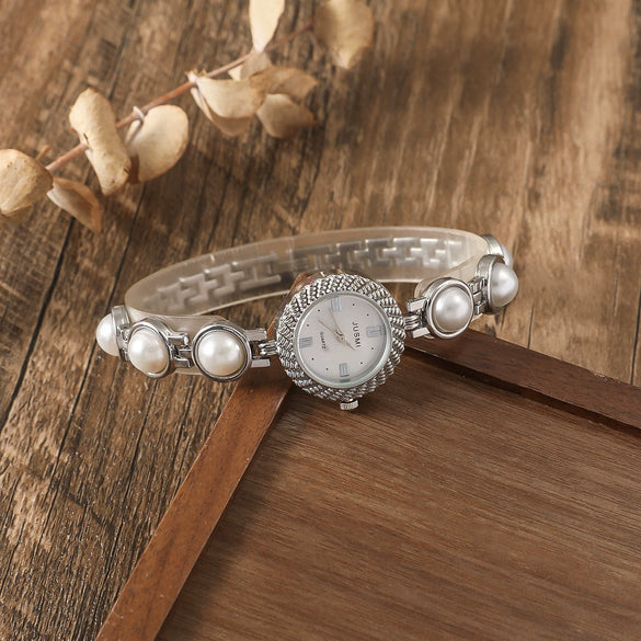 Fashionable Alloy Case Stainless Steel Strap Oval Dial Women's Pearl Thin Belt Fritillary Quartz Watch With Spiral Crown And Ordinary Glass Mirror