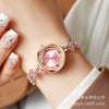 Fashionable Alloy Women's Bracelet Watch With Rhinestone Ball Quicksand And Round Dial