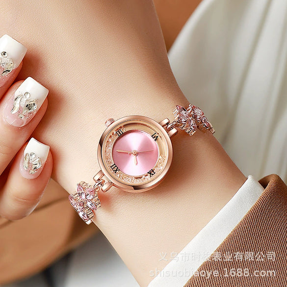 Fashionable Alloy Women's Bracelet Watch With Rhinestone Ball Quicksand And Round Dial