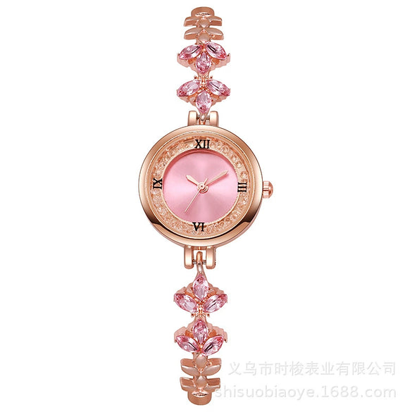 Fashionable Alloy Women's Bracelet Watch With Rhinestone Ball Quicksand And Round Dial