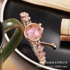 Fashionable Alloy Women's Bracelet Watch With Rhinestone Ball Quicksand And Round Dial