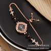 Fashionable Alloy Women's Bracelet Watch With Rhinestone Ball Quicksand And Round Dial