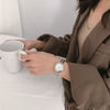 Female Fashion Retro Artistic Alloy And Stainless Steel Bracelet Watch With Round Dial